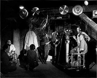 Left: J. Carrol Naish in the wheelchair, Right: behind the camera are Al Adamson (standing) and Gary Graver (seated)